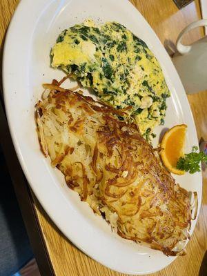 Omelette with feta and spinach/ heaping delicious hash browns . Yum !