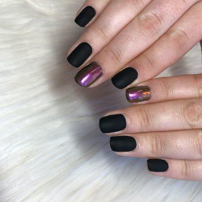 Matte black with chrome  accent nail . Gel manicure