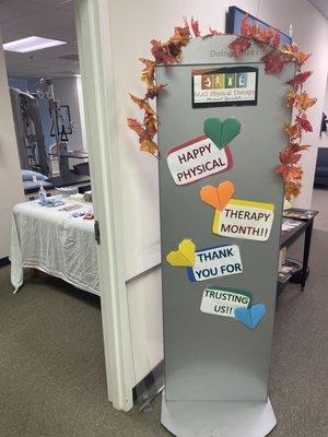 Sign that reads "Happy physical therapy month!! Thank you for trusting us!!"