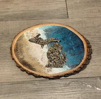 Michigan log art "Surf and Sand". Sand and stones are collected from Michigan beaches.