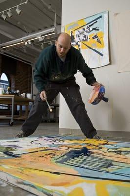 Artist-in-Residence Howard Sherman, working in his studio