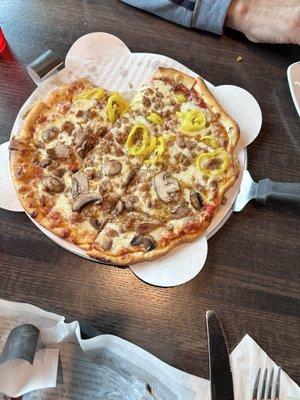 Pizza (12-inch) Sausage, banana peppers, and fresh mushrooms