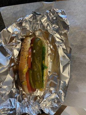 Chicago style hotdog; mustard, peppers, pickle, neon Green relish, tomato, onion & special seasonings