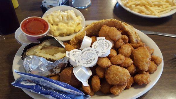 Seafood Platter $9.55 Fried catfish, scallops, clams, popcorn shrimp, Mac and cheese, baked potato.