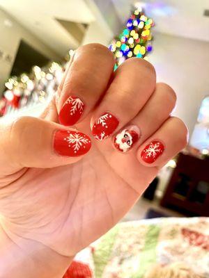 Gel manicure with fun holiday designs!