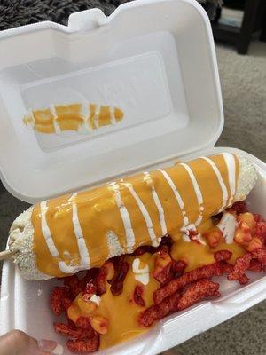 Elote Entero With hotcheetos, queso nacho, crema