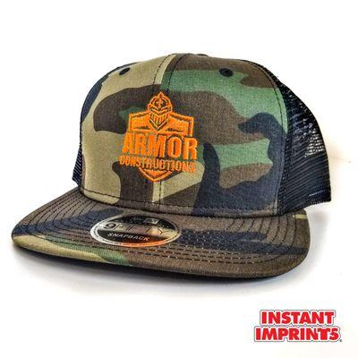 Embroidered Camo New Era Snap Back.