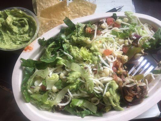 Barbados bowl with 1/2 fajita veggies 1/2 brown rice, with chips & guacamole.