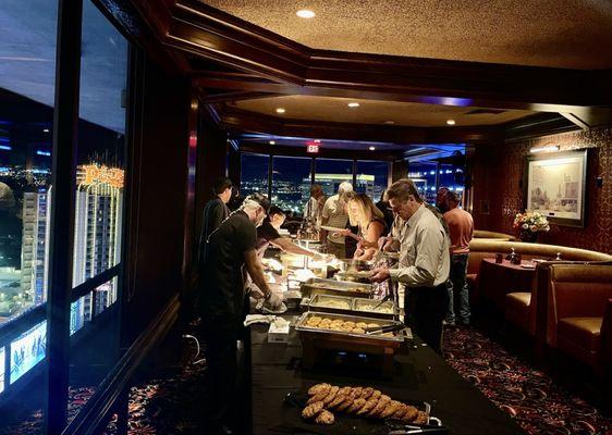 Buffet with carving station at steakhouse.