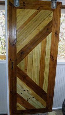 Screened in porch  barn door slider I made from scratch.  Slides nicely and I made the jamb of the door tight , keeping the bugs out