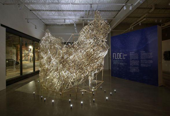 Night view of "Glacier," a monumental sculpture in FLOE: A Climate of Risk | The Fictional Archaeology of Stephen Talasnik.