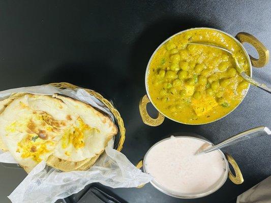 Matar paneer raita and garlic naan