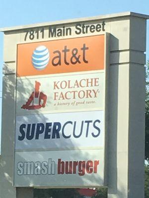 Supercuts Outdoor Sign with Address.