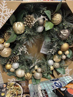 $50 prelit Christmas wreath...takes D batteries and has a timer