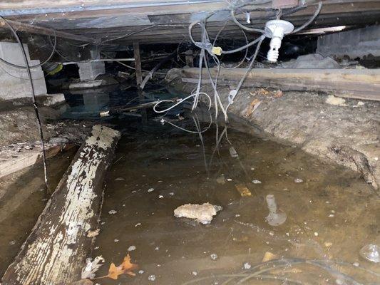 Crawl Space Under Lake House where everything needed moved and replaced.