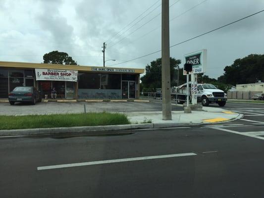 The street view of the barber shop.