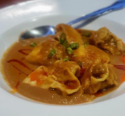 Szechuan wonton appetizer with spicy peanut satay, $7.95