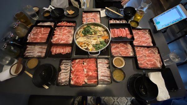 Sukiyaki broth with a lot of meats.