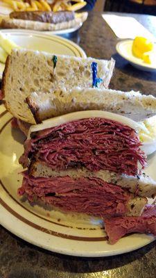 Look at this monster! Corned beef and pastrami with swiss cheese!