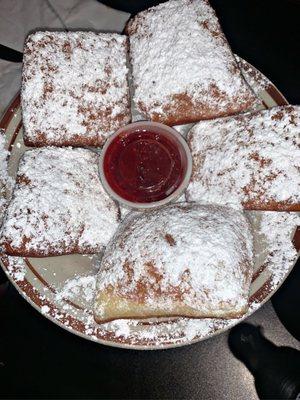 Beignets with a cranberry dipping sauce. To die for!