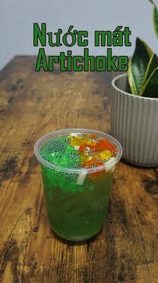 A combination of the artichoke flower with cane sugar served with rainbow jelly, basil seeds and a few ice cubes