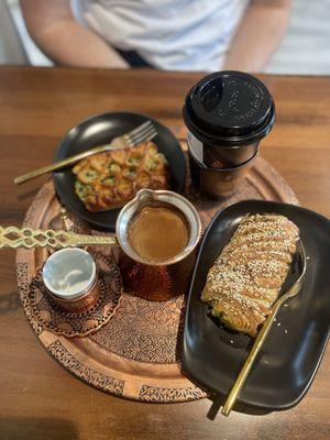 Turkish coffee, Harazi Mufawar, spinach feta and something with thyme (they did not have name tags).