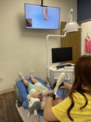 Using the latest technology to make a 3D scan of her teeth!