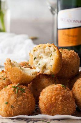 It's  crispy rissotto ball(hand made special rice ball with permenson cheese and mozzarella cheese in side)