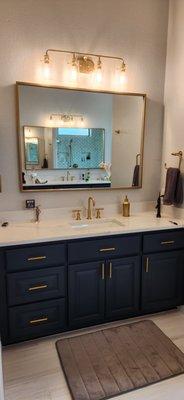 Master bath with brass fixtures.