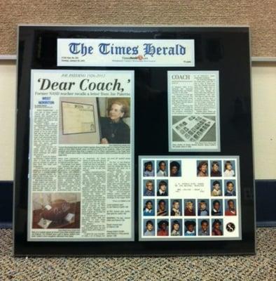 Newspaper article preserved and displayed on a Laminated Hardwood Plaque