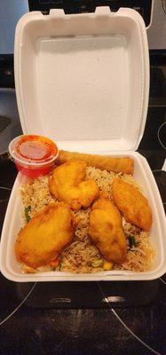 Sweet and sour chicken with fried rice.