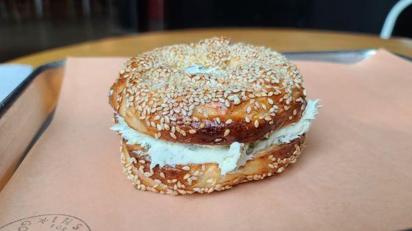 Sesame bagel with jalapeño cream cheese.