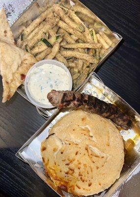 Moussaka ($25)  Zucchini Sticks ($16) Kefta Skewer ($7) Tzatziki