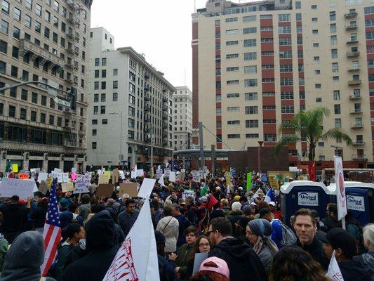 On the steps of Pershing Square.