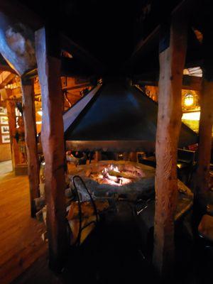 Fire going in the center of the bar.