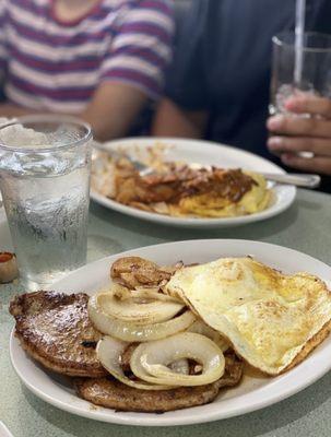 Hamburger steak and eggs with grilled onion