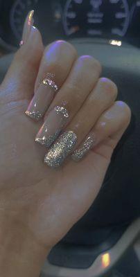 Gel acrylic medium length with gems done by Traci