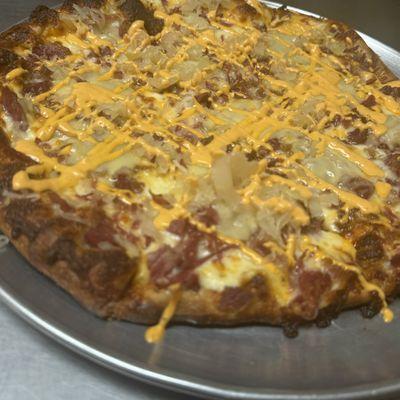 Take on a Reuben sandwich pizza