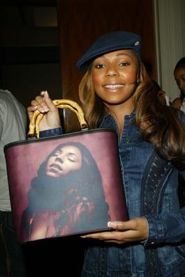 Ashanti walked the red carpet with her Photo Handbag