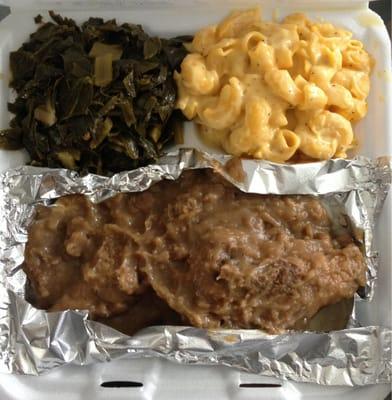 Smothered Chicken on Mashed Potatoes : Mac 'n Cheese : Collard Greens $6.75