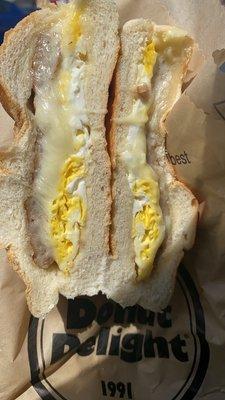 Sausage egg cheese on roll