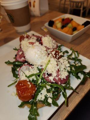 Avocado Toast with a Poached Egg $12 (included fruit)