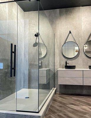 Floor to ceiling panels make an impact in any size bathroom! Come see for yourself in our Showroom.