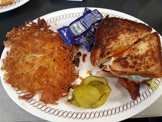 BLT with egg on Texas toast with scattered, smothered, capped hash browns