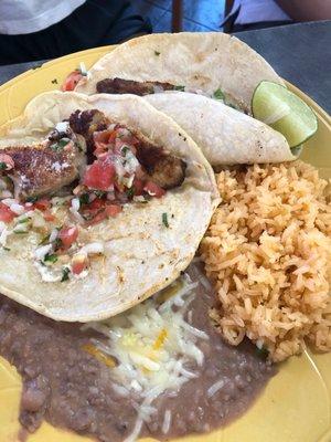 Fish taco with beans and rice