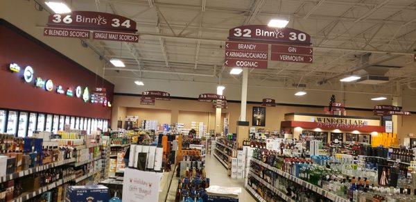 Beer fridge wall (photo far left) and wine cellar (photo back right), plus endless aisles of liquor