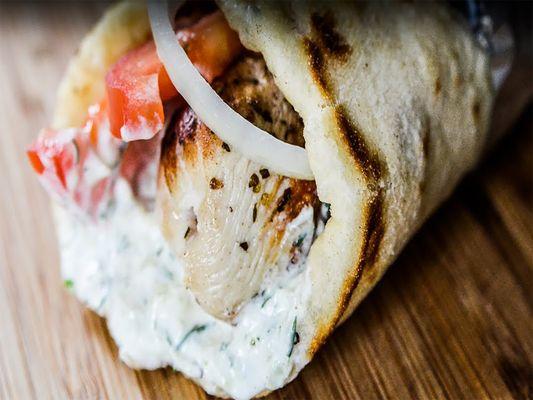 Souvlaki on Pita ($10): Greek seasoned pork tenderloin kabob on a pita served with tomatoes, onions, and tzatziki sauce.