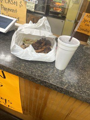 Oxtail rice and peas cabbage and a UP smoothie