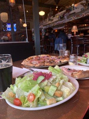 Pizza, salad and beer.