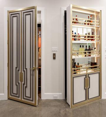 Custom door and hidden room behind bar.